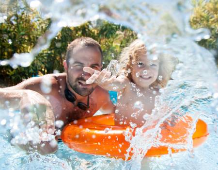 Father and Son in Los Sueños Beach Club Pool