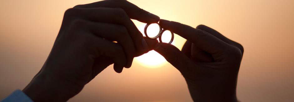 wedding rings and Costa Rica beach sunset